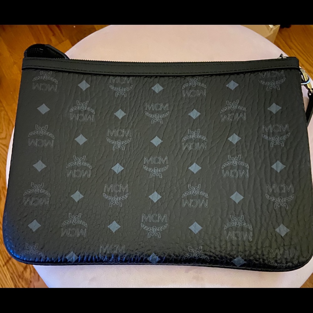 Visetos authentic MCM black leather pouch.